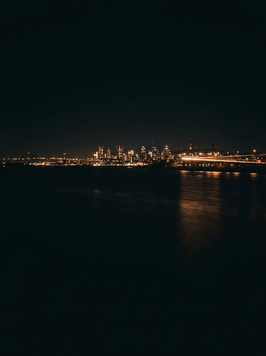 Montréal skyline at night across the St. Lawrence